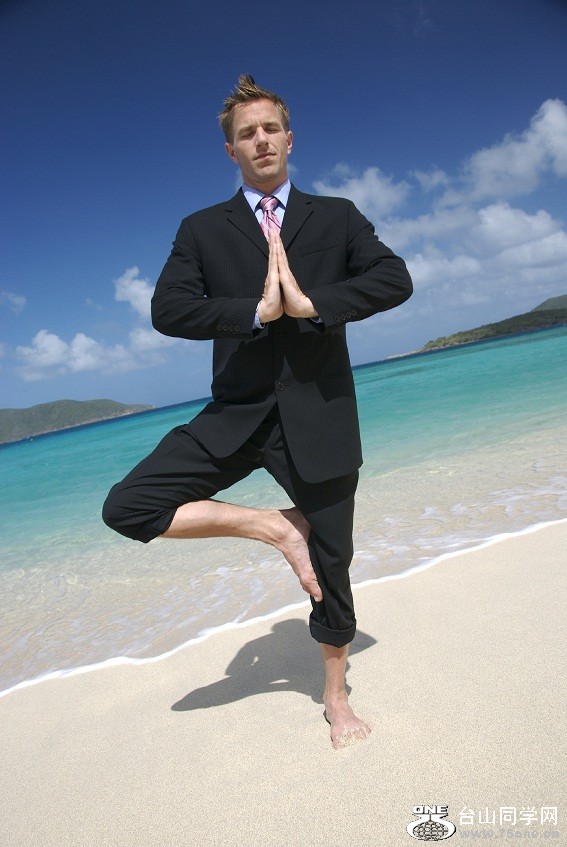 Man-standing-on-beach[1].jpg